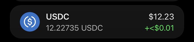 A digital wallet interface showing a balance of 12.22735 USDC, valued at $12.23.
