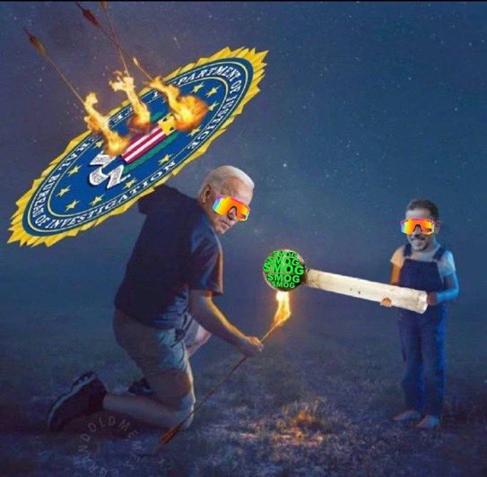 The image features a man holding an umbrella, with a child standing next to him wearing sunglasses. They are both looking at a small green ball that has been lit on fire by a lighter. The caption reads "Moggers spoke of this". This suggests that the image is related to a post or conversation about the Moggers, possibly a political group or organization.