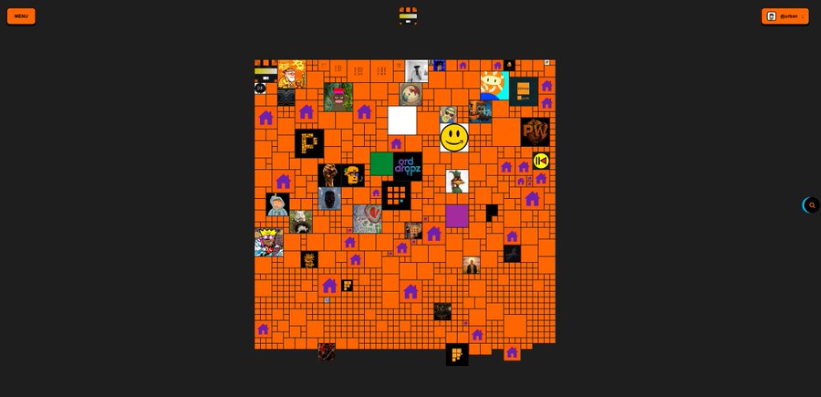 A dark screenshot of a web-based game, 'gob.run', displays a chaotic orange mosaic grid filled with numerous overlapping user avatars, meme faces, and small character icons.