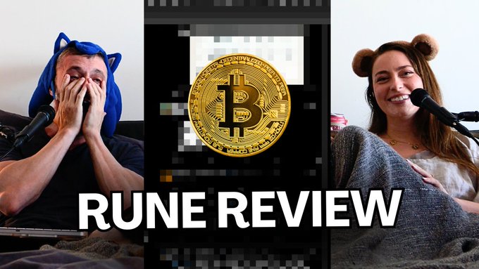 The image features a man wearing a blue hat, sitting next to a woman with a brown bear headband. They are both looking at a screen displaying an advertisement for Bitcoin. The text "RUNE REVIEW TOMORROW AT 9AM PST" is written in white letters below the image of the Bitcoin symbol.