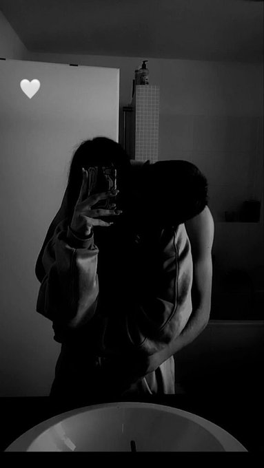 A moody, black-and-white mirror selfie of a person holding up their phone, with a small heart icon drawn in the upper left corner, taken in a dimly lit bathroom.

The image itself has no clear connection to the post about Web3 projects like @useTria and @quipnetwork—it simply shows a personal, intimate goodbye moment ("gn ct — see y'all tomorrow") before the caption pivots to a thread on decentralized UX and compute.