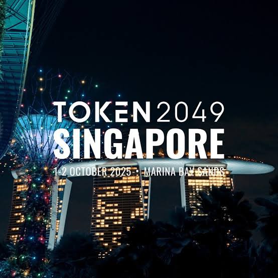 Promotional image for TOKEN2049 Singapore taking place 1-2 October 2025 at Marina Bay Sands, featuring the illuminated Supertree Grove and skyline at night, with the post highlighting Pi Network's support role at the event.