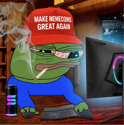 A Pepe the Frog meme dressed in a blue shirt and red 'MAKE MEMECOINS GREAT AGAIN' cap, smoking a cigarette while sitting at a gaming/PC setup.