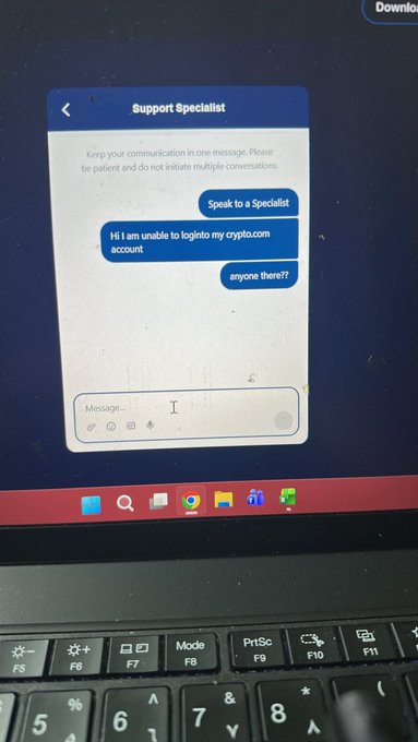 A user is shown on a Crypto.com Support Specialist chat page, having messaged 'Hi I am unable to loginto my crypto.com account' and 'anyone there??' but receiving no response.