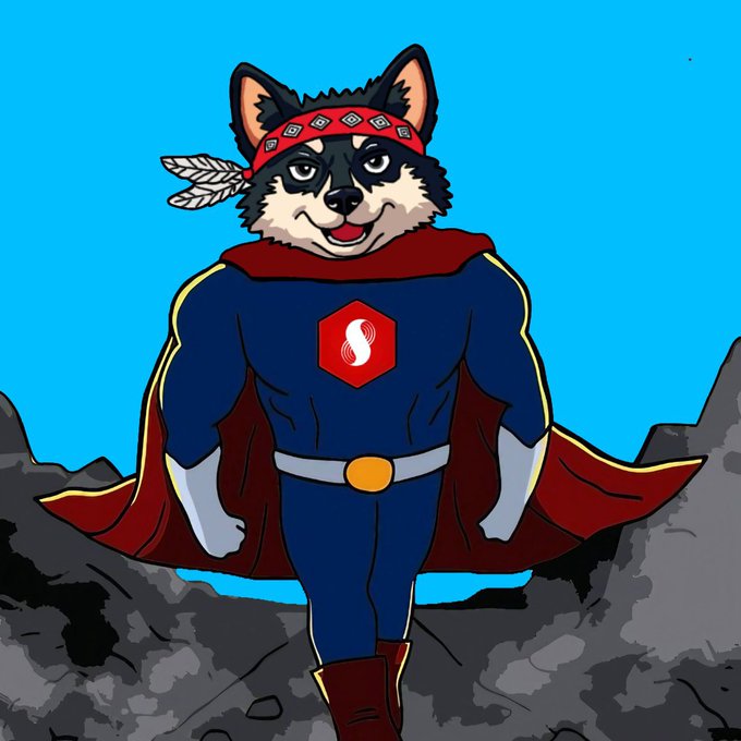 An illustrated superhero dog resembling a Shiba Inu, wearing a blue costume with a red cape, a red bandana with feathers, and a flame emblem on its chest, standing against a blue sky with rocky terrain.