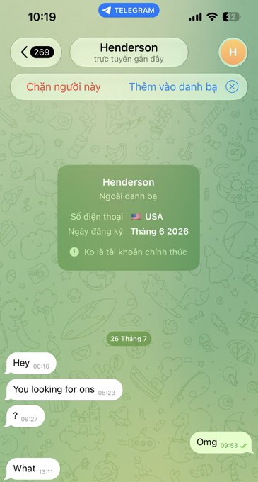 A screenshot of a Telegram chat in Vietnamese with a contact named 'Henderson' from the USA. The chat shows short English messages including 'Hey', 'You looking for ons', '?', 'Omg', and 'What', with Henderson's profile marked as not an official account.