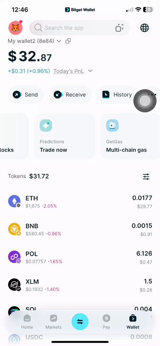 The image features a phone screen displaying various apps, with the main app being related to Bitcoins and Wallet. It has a white background, making it stand out against the other elements on the screen. In the bottom left corner of the image, there's some text that reads "Qwerti is now on the Bitget Wallet DApp Store No need to remember domains, and no more worries about accessing fake websites". The image focuses solely on the app and its features for a clear view of the relevant information.