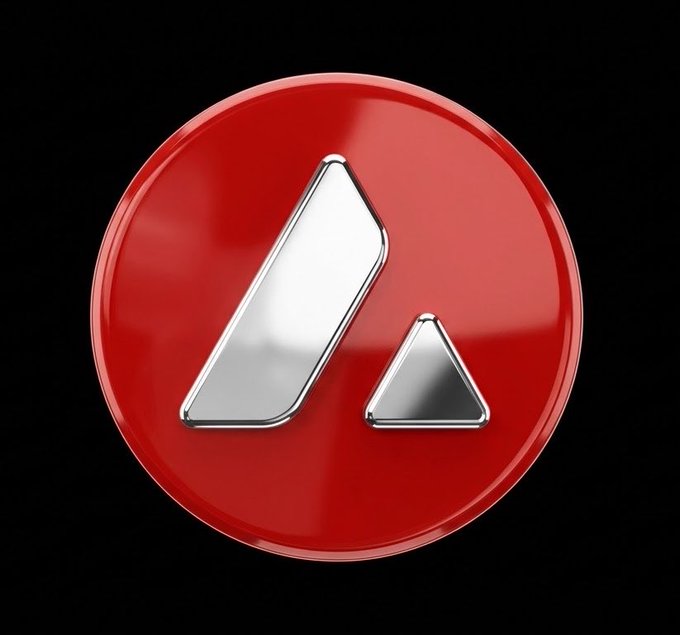 A red circular logo with a metallic silver "A" letter design in the center on a black background, resembling the Avalanche (AVAX) cryptocurrency logo.