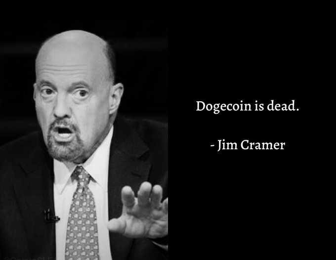 The image features a man wearing a suit, with his hand outstretched as if he's about to make a point or gesture. The text "DOGE coin is dead" is displayed above him, which seems to be a reference to Bitcoin. The caption below the image reads "You know what to do $DOGE", possibly referring to a humorous statement or joke related to Bitcoin.