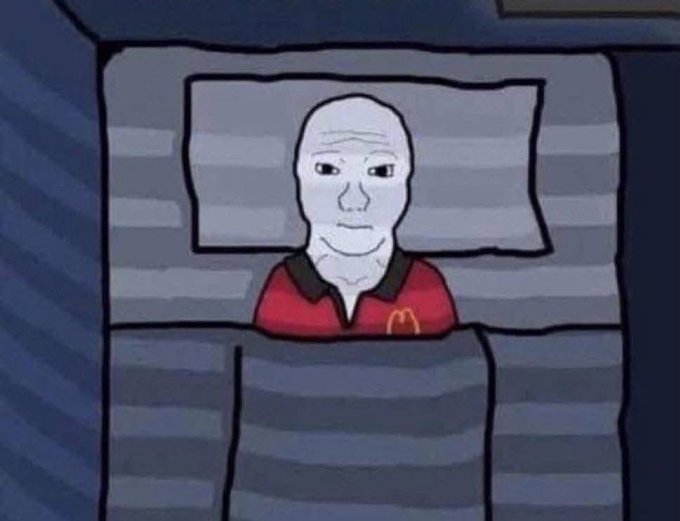 The image shows a "Doomer Wojak" cartoon character—a bald, melancholic-looking figure in a red McDonald's polo shirt lying in bed, a popular meme expressing disillusionment and resignation. This perfectly captures the post's nostalgic lament about the early crypto boom days, with the wojak embodying the sense of loss and sadness over the market's current state compared to its once-thriving past.