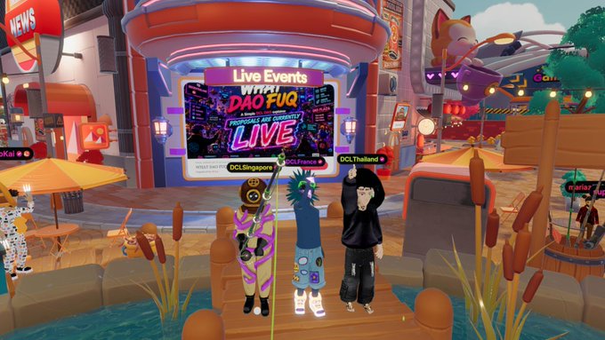 Three avatars stand on a dock in a vibrant virtual world, with regional labels "DCL Singapore," "DCL Florence," and "DCL Thailand" displayed on the central "Live Events with DAO FUQ" screen, illustrating the platform's global community connections.
