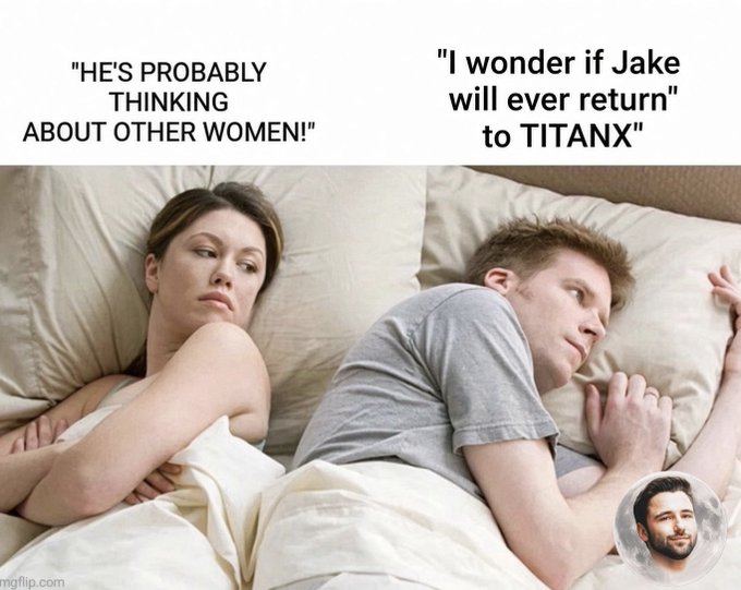 A meme showing a couple in bed looking away from each other with text 'HE'S PROBABLY THINKING ABOUT OTHER WOMEN!' above the woman and '"I wonder if Jake will ever return to TITANX"' above the man, featuring a small circular image of a bearded man.
