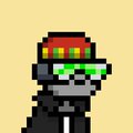 A small pixel art character with a dark hooded outfit, green glowing visor, and red goggles on top of the head, set against a pale yellow background.