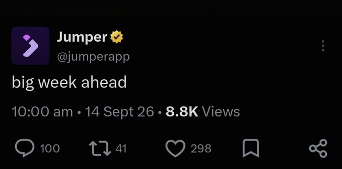 A X (Twitter) post from "Jumper" (@jumperapp, verified with a yellow badge) captioned "big week ahead" with 100 replies, 41 reposts, 298 likes, and 8.8K views, posted at 10:00 am on 14 Sept 26. The post teases an upcoming event—fitting with the reply urging Jumper to "Just announce the jumper tge bro," suggesting the "big week" likely refers to a Token Generation Event (TGE) announcement.