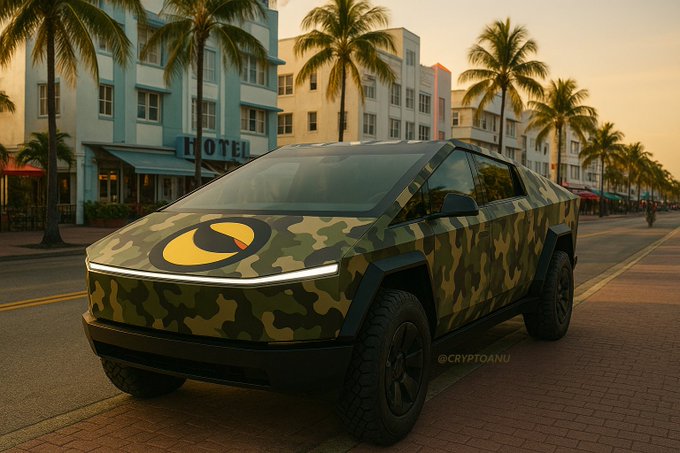 A Tesla Cybertruck with a camouflage wrap and a yellow eye-like logo parked on a street lined with palm trees and a hotel building, marked with '@CRYPTOANU' watermark.
