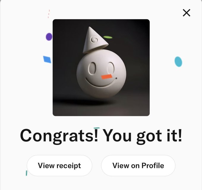 A digital pop-up notification displaying a 3D white smiley face with a party hat and confetti, with the text 'Congrats! You got it!' and buttons for 'View receipt' and 'View on Profile'.
