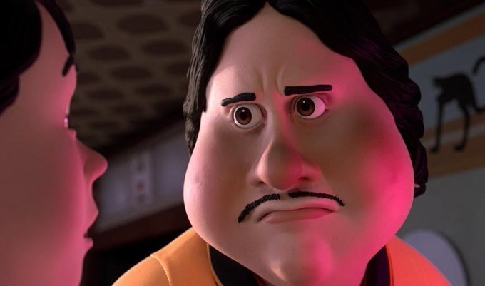 A 3D animated close-up of a character with black hair, a mustache, and a concerned expression, lit with red tones, from what appears to be a film.