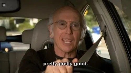Larry David drives while grinning in a car, with the subtitle "pretty pretty good."—a meme expressing quiet, self-satisfied contentment, perfectly capturing the calm detachment of steadily dollar-cost-averaging while ignoring market noise.