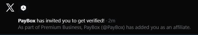 A notification on X (formerly Twitter) showing that PayBox has invited the user to get verified as part of Premium Business.