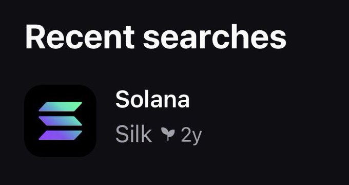 A dark-themed "Recent searches" interface displays a result for "Solana" with an associated app called "Silk" that has a butterfly icon and a "2y" timestamp (likely indicating 2 years old), featuring Solana's signature purple-to-teal gradient logo. The image relates to the post about the token ticker $Silk, whose contract address ends in "T6pump," being shared as a potential early find on the Solana blockchain.