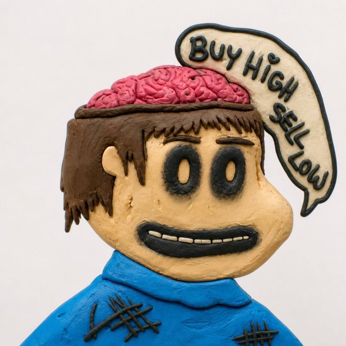 A claymation-style figure with an exposed brain and a speech bubble reading 'BUY HIGH SELL LOW', depicting a financially misguided character in a blue shirt.