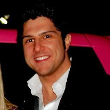 The image features a man wearing a white shirt and black jacket smiling at the camera. The caption above him reads "BNB may be one of the most underappreciated chains among U.S. investors," which suggests that he might have an interest in or knowledge about Bitcoin, a digital currency. This post could potentially be related to Bitcoin or cryptocurrency news, as it highlights BNB's importance and impact on the market.