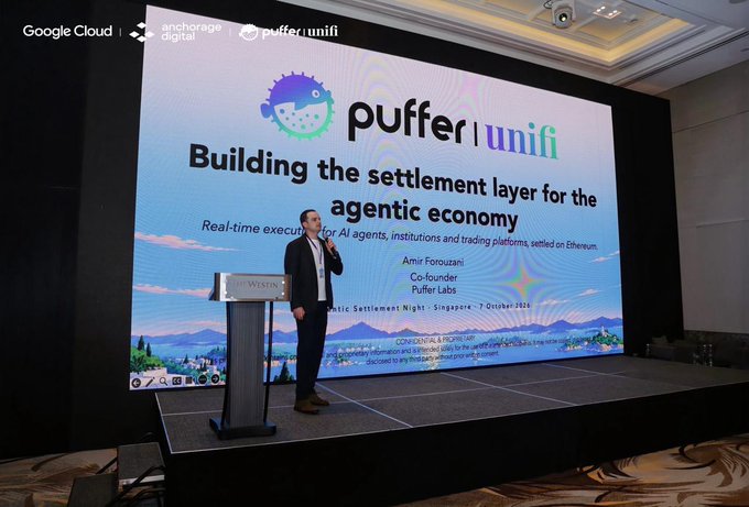 A man in a suit gives a presentation on stage titled 'Building the settlement layer for the agentic economy' for Puffer | unifi, with Google Cloud and Anchorage Digital logos visible, presented by co-founder Amir Forouzan at a Singapore event on 7 October 2026.