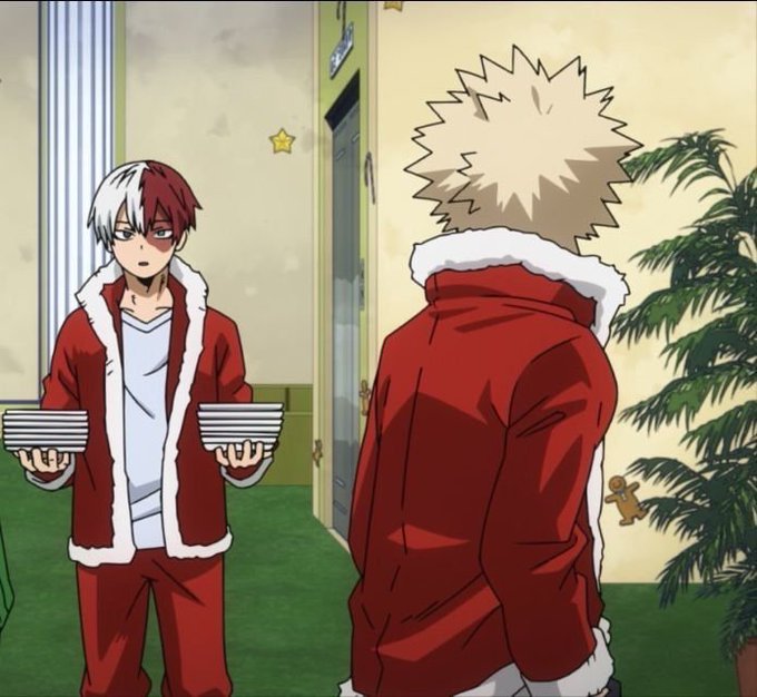 An anime scene featuring a character with red and white hair in a Santa outfit carrying two stacks of plates, facing another character in a similar Santa costume.