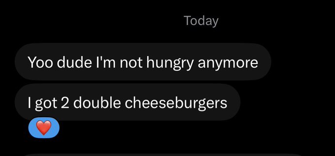 A screenshot of an iMessage conversation from "Today" showing two texts: "Yoo dude I'm not hungry anymore" followed by "I got 2 double cheeseburgers" with a heart emoji reaction—suggesting the sender felt full after eating two double cheeseburgers.