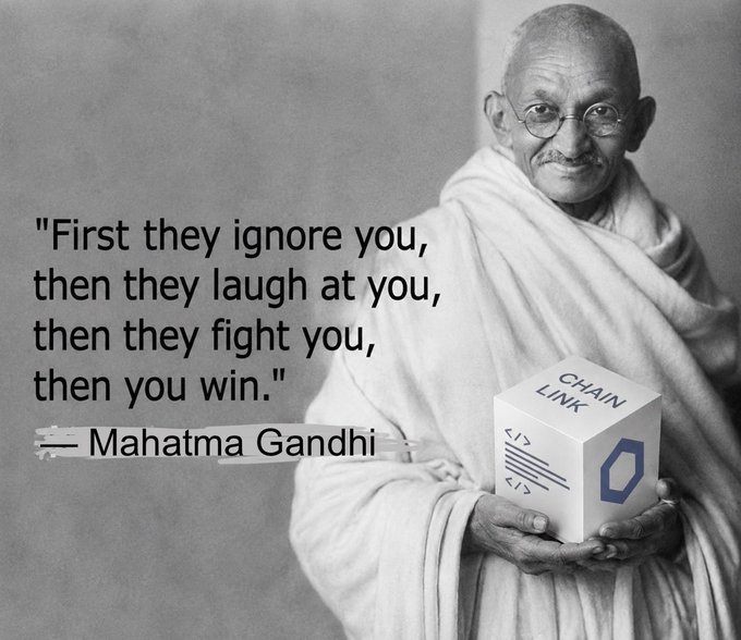 A black and white image of Mahatma Gandhi holding a cube labeled 'CHAIN LINK' with the famous quote: 'First they ignore you, then they laugh at you, then they fight you, then you win.'
