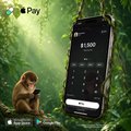 An Apple Pay advertisement showing an iPhone displaying a payment of $1,500, with images of a monkey visible on the side of the phone, set against a jungle background.