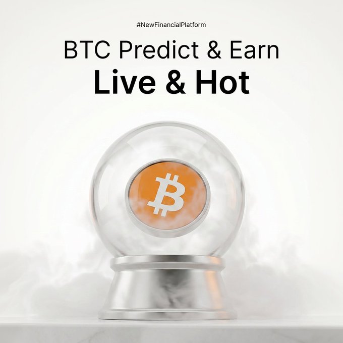 The image features a glass globe with an orange Bitcoin symbol at its center, surrounded by smoke. Below the globe, there's text that reads "BTC Predict & Earn Live & Hot" followed by a hashtag (#bitcoin). The background of the image is white, and there are two other objects in the scene - a coin on the left side and a cloud-like shape above it.