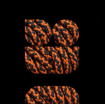 A texture sample or material preview showing an orange and black braided rope pattern displayed across different geometric shapes on a black background.