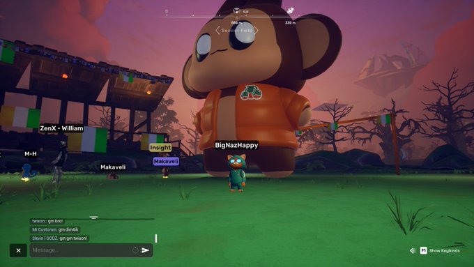 A screenshot from the game 'Animal Company' showing a giant monkey character named 'BigNazHappy' alongside other players like 'ZonX-William' and 'Makaveli' on a grassy field.