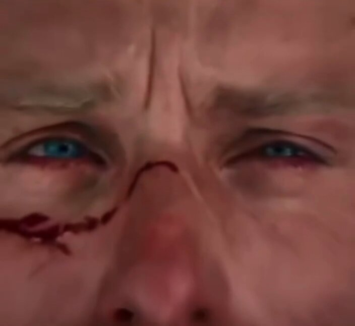 A close-up of a man's face, showing only his eyes and nose, with red blood stains around his eye sockets. The image also contains text that reads "Newbie that bought Bitcoin for the first time at $125K right now." This could be interpreted as a humorous take on the challenges faced by someone who is new to investing in cryptocurrency like Bitcoin or has recently experienced an unfortunate incident involvingBitcoin, such as losing a significant amount of money.