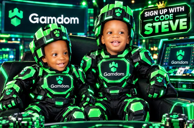 Two smiling young children wearing matching green and black 'Gamdom' branded robotic armor sit in front of computer monitors, with a promotional graphic reading 'SIGN UP WITH CODE STEVE' in the corner.