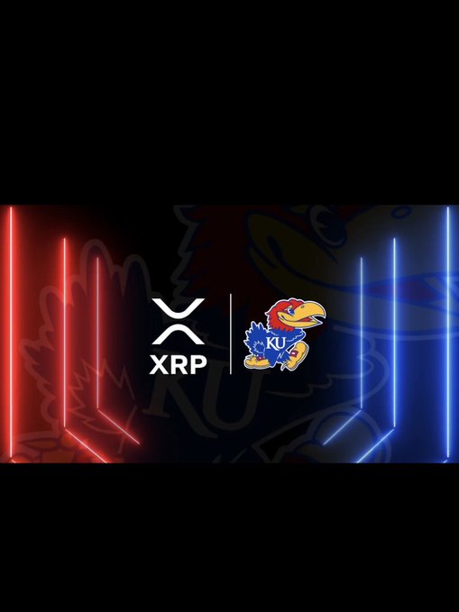 The image shows a promotional graphic for the partnership between Ripple (XRP) and the Kansas Jayhawks, featuring the XRP logo alongside the KU Jayhawk mascot against a red and blue neon-lit background that echoes the team's colors. This visual represents the groundbreaking sponsorship deal bringing the XRP brand to Jayhawk athletic uniforms.