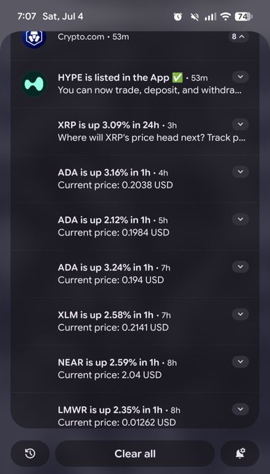 Crypto.com mobile app notifications showing HYPE listing announcement and price alerts for XRP (+3.09%), ADA, XLM, NEAR, and LMWR with current USD prices.