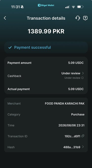 Screenshot of a Bitget Wallet transaction details page showing a successful payment of 1389.99 PKR (5.09 USDC) to FOOD PANDA KARACHI PAK, with a pending tethergold (XAUT) cashback.