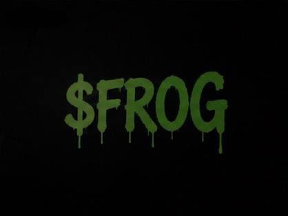 Green graffiti-style text reading '$FROG' is displayed on a black background, with the letters appearing to drip downward.