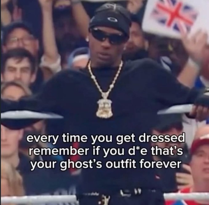 A meme featuring a young man in sunglasses and a large gold chain at what appears to be a wrestling event, with overlaid text reading 'every time you get dressed remember if you d*e that's your ghost's outfit forever'.