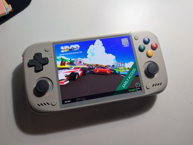 A white handheld gaming console displaying the title screen for 'SUPER FOX BOX GRAND PRIX' with an 'EARLY ACCESS' banner.