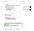 A blurry screenshot of a search results page with some items highlighted by green boxes, text is too small to read clearly.