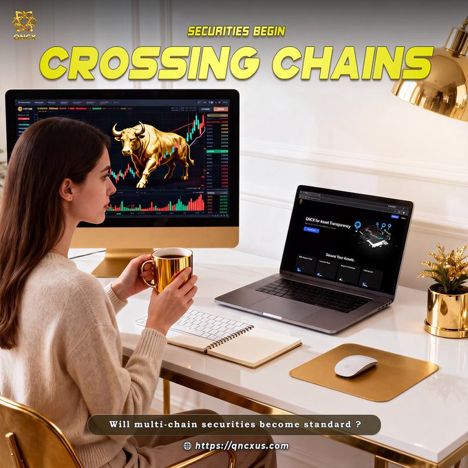 The image shows a woman at a sleek desk holding a golden mug while viewing a large monitor displaying a bullish gold bull chart alongside trading data, with an open laptop beside her—visually reflecting the post's theme of multi-chain securities expansion. Bold text reads "SECURITIES BEGIN CROSSING CHAINS," with the caption "Will multi-chain securities become standard?" and the link https://qncxus.com, tying together the idea of tokenized stocks bridging across blockchain networks.