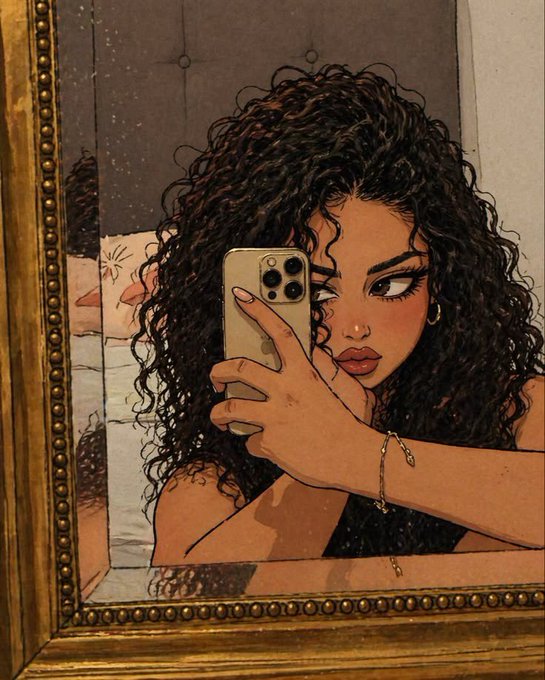 The image features a woman with curly hair taking a selfie using her cell phone's mirror feature. The photo captures her reflection, which includes herself holding up her phone to take the picture. The background of the image appears to be a bedroom setting, as there is a bed visible in the scene.