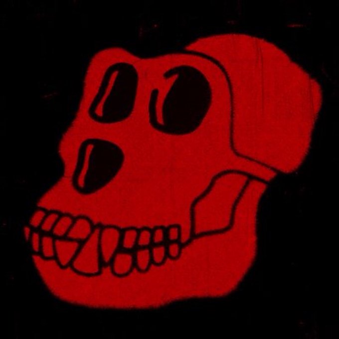 A stylized red skull illustration with large eye sockets and prominent teeth against a black background, evoking the bold, edgy aesthetic of Bored Ape Yacht Club (BAYC) NFT art. The image complements the post's enthusiastic message celebrating the BAYC community's resurgence and hype.