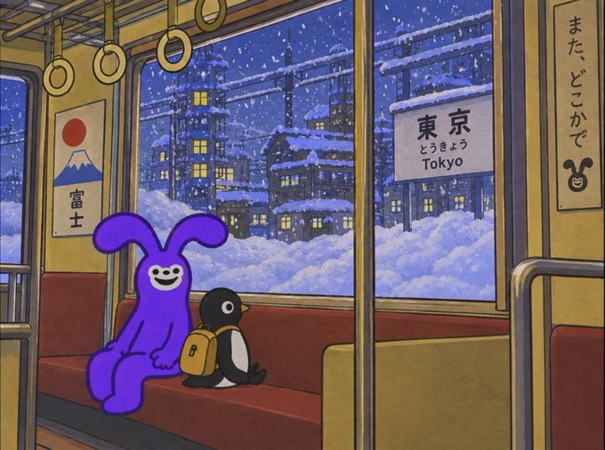An animated illustration shows a purple bunny-like character and a penguin wearing a yellow backpack sitting on a train, with a snowy cityscape and a sign reading '東京 Tokyo' visible through the window.