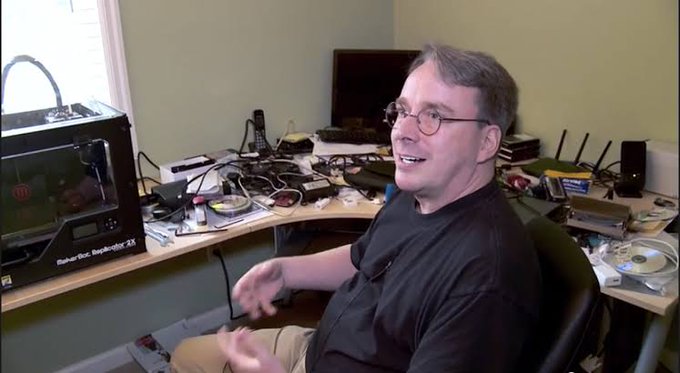 The image features an older man sitting at his desk, wearing glasses and smiling as he looks directly into the camera. The desk has various electronic devices such as a computer monitor, keyboard, mouse, and several cables connecting them together. There are also some books scattered around on the desk. In the background, there is another person partially visible behind the main subject.

The image seems to be related to a post about Bitcoin or blockchain technology, possibly discussing the Hyper Liquid blocking users, Arbitrum blocking users funds, Trezor safe 7 sold wallets in the name of quantum proof and now getting hacked. The man's smile suggests that he is enjoying the conversation or sharing his thoughts on the topic.