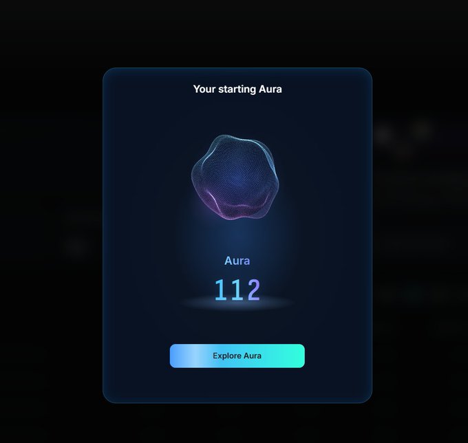 A dark blue digital card titled 'Your starting Aura' displays an abstract, glowing 3D blob, the word 'Aura', the number '112', and a teal button labeled 'Explore Aura'.