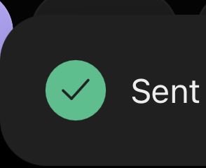 A close-up of a dark messaging app interface showing a 'Sent' status with a green checkmark.